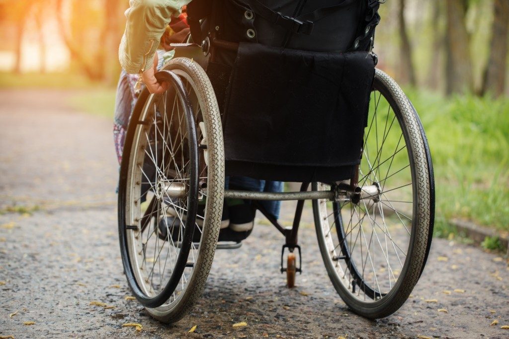 Photo of a wheelchair in the park