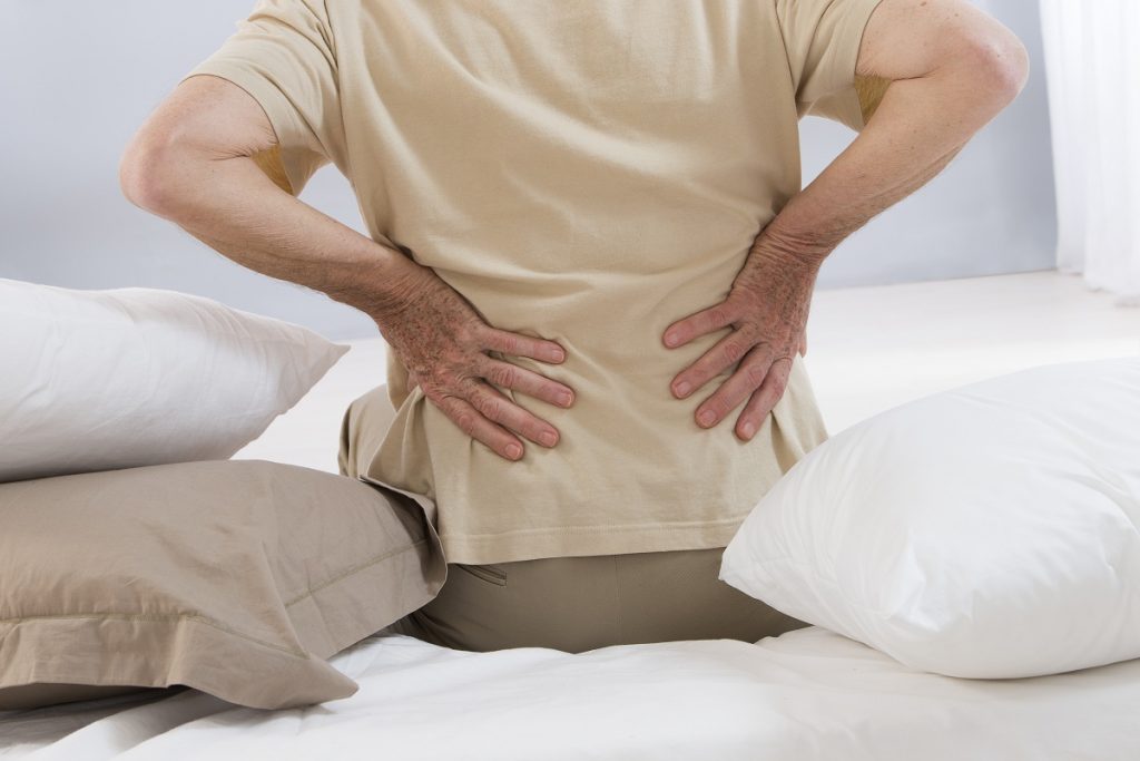 Elderly feeling back pain