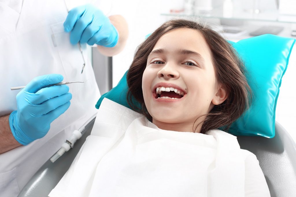 Kid having a dental treatment
