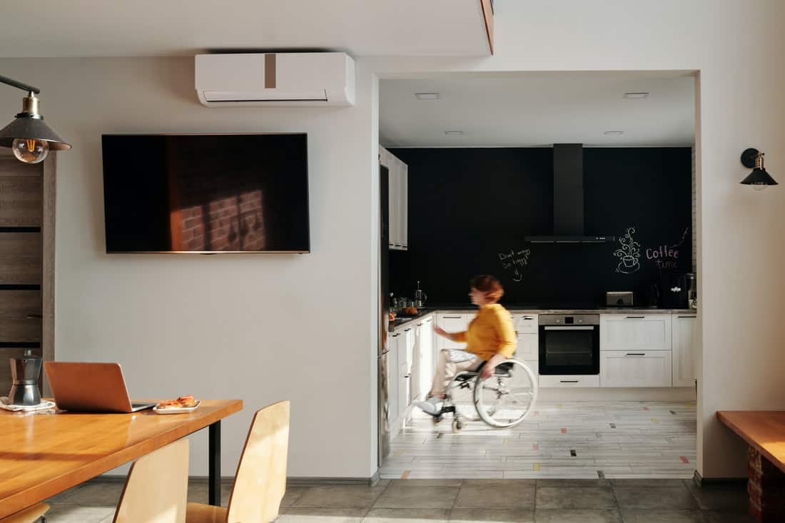 woman in a wheelchair in the kitchen