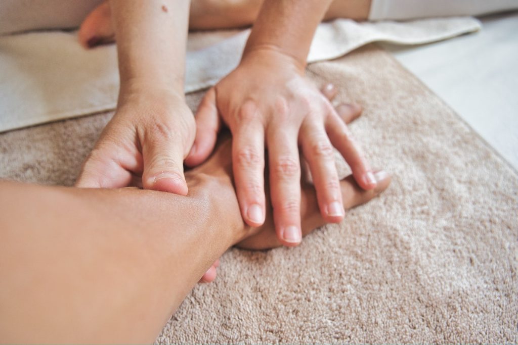 massaging a hand