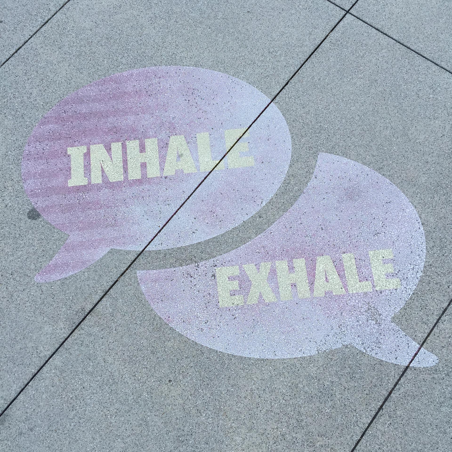 inhale and exhale drawn on the floor