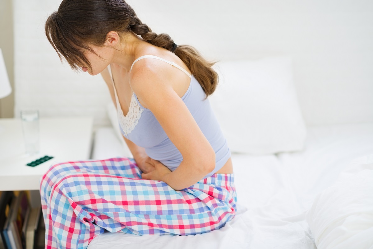 woman suffering from abdominal pain